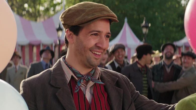 Jack smiling while holding balloons in Mary Poppins Returns