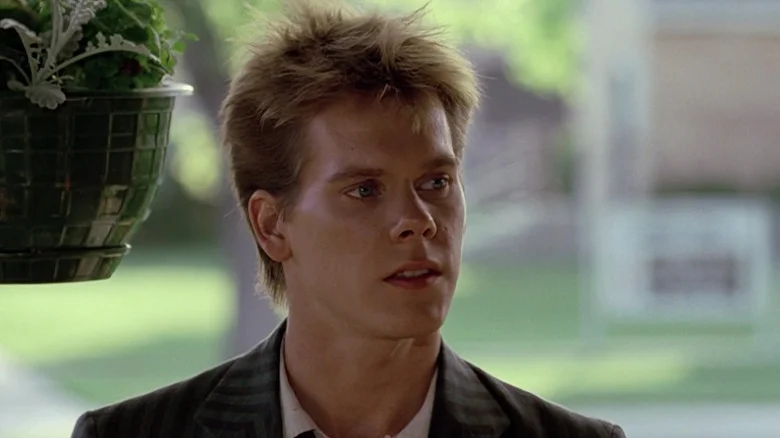 Ren McCormack in a suit in Footloose (1984)