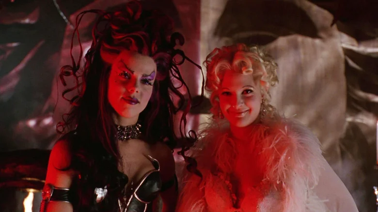 Spice and Sugar smiling as they stand together in Batman: Forever