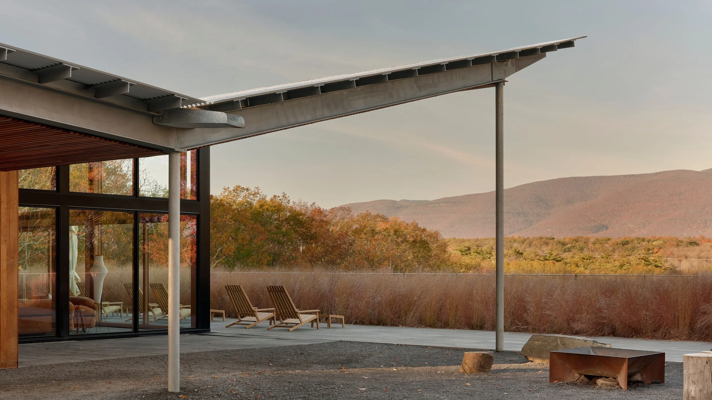 Image may contain Bus Stop Outdoors Architecture Building Shelter Chair Furniture Bench House Housing and Porch