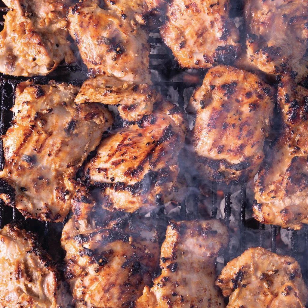 Misopeanut hibachi chicken on a grill
