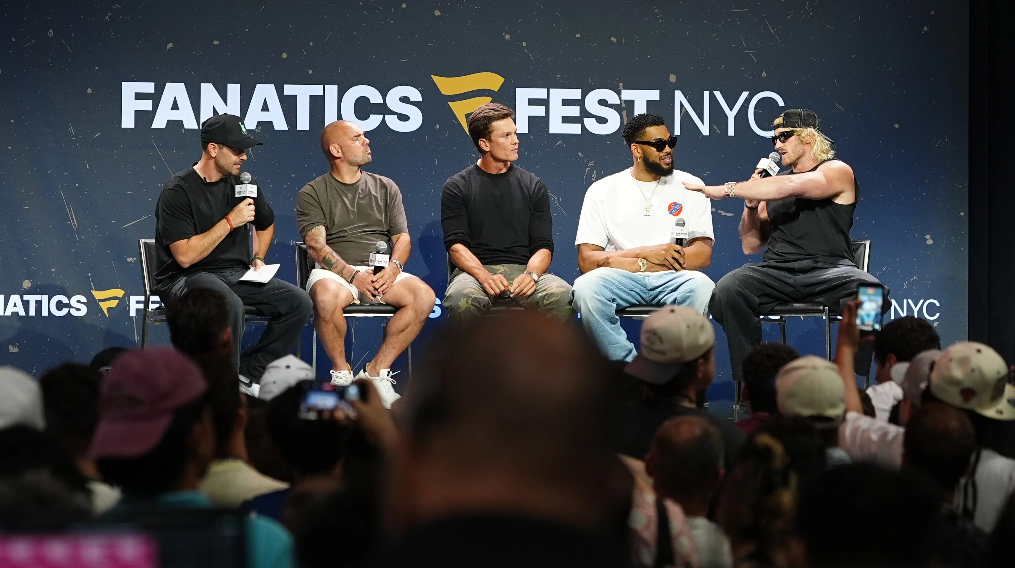 Chris Costa, Wesley Sneijder, Tom Brady, Karl-Anthony Towns and Logan Paul speak during the This is Why We Collect panel at Fanatics Fest NYC 2026 at Jacob Javits Center on July 17, 2026.