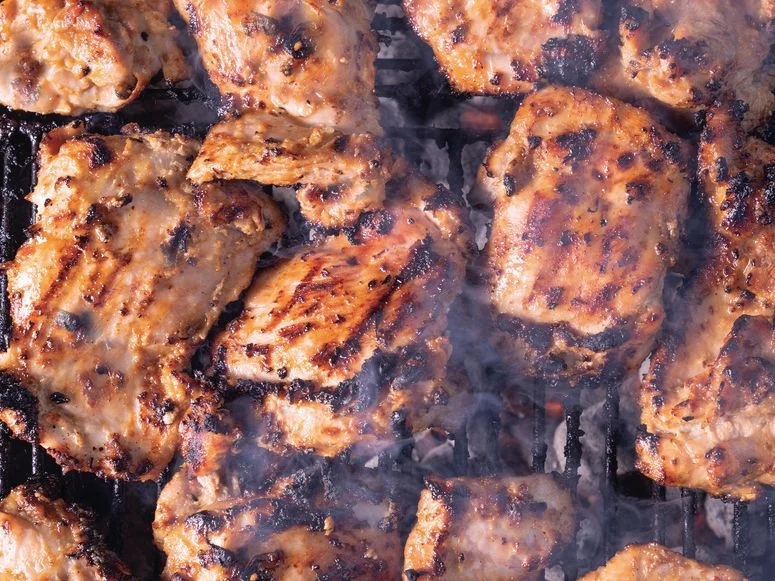 Misopeanut hibachi chicken on a grill