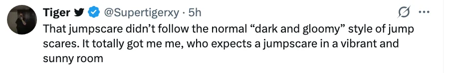 Tweet discussing an unexpected jumpscare occurring in a vibrant, sunny room instead of the usual dark, gloomy setting
