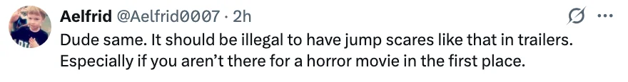 A tweet expressing frustration about unexpected jump scares in movie trailers, especially for non-horror films