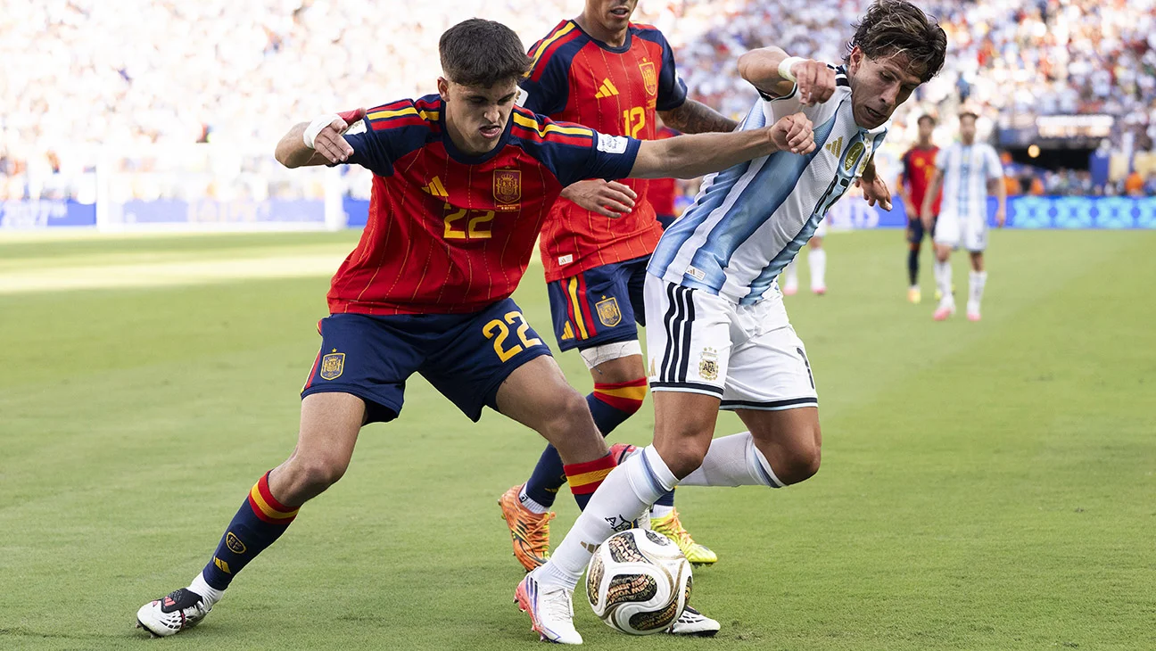 Pau Cubarsi #22 of Spain competes for the ball against Giuliano Simeone #17 of Argentina during the FIFA World Cup 2026 Final match between Spain and Argentina at New York New Jersey Stadium on July 19, 2026 in East Rutherford, New Jersey.