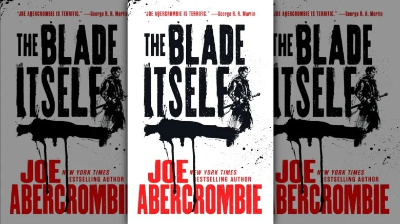 A figure carrying a sword on the cover of The Blade Itself