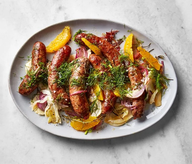 Image may contain Dish Food Meal Platter Plant Pork and Lunch