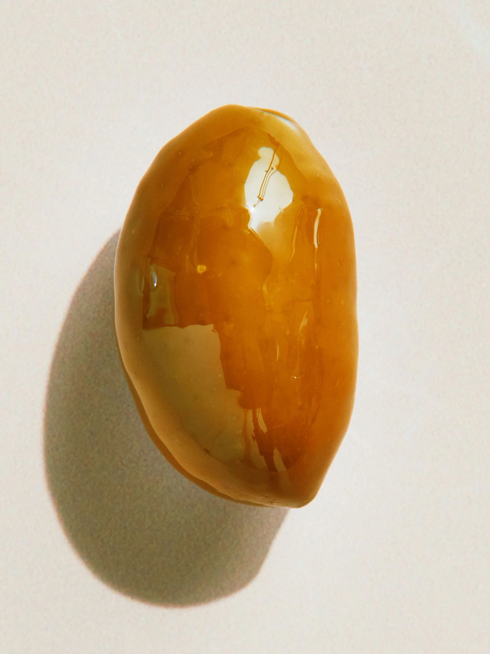 One large brown Cerignola olive