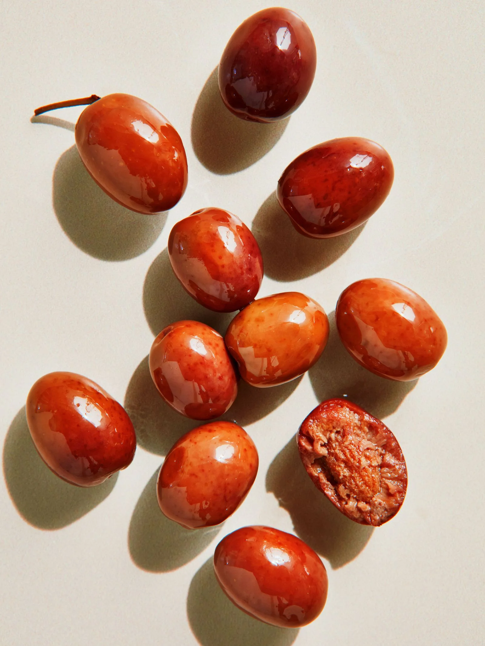 Several small reddishbrown Gaeta olives
