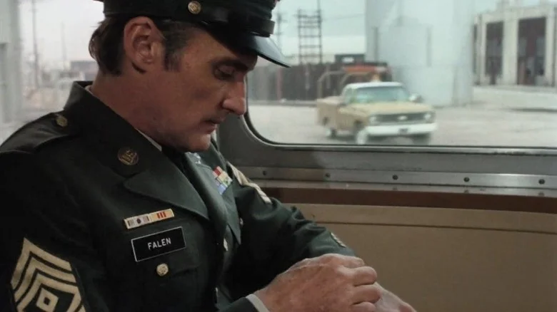 Sergeant Jack Falen on a train in Tracks
