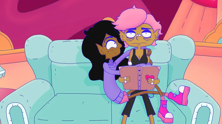 Saira cozying up to Kiki on a couch in Lesbian Space Princess