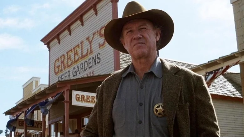 Gene Hackman as Bill, surveying his town in Unforgiven