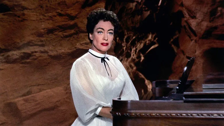 Joan Crawford as Vienna, playing the piano in Johnny Guitar