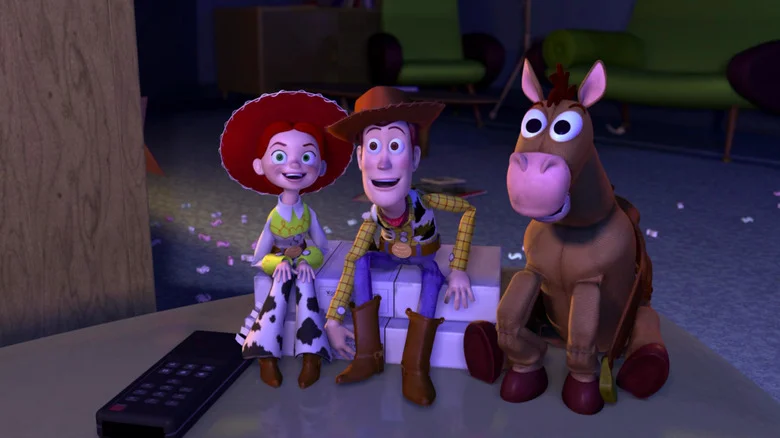 Jessie Woody and Bullseye looking at something in Toy Story 2
