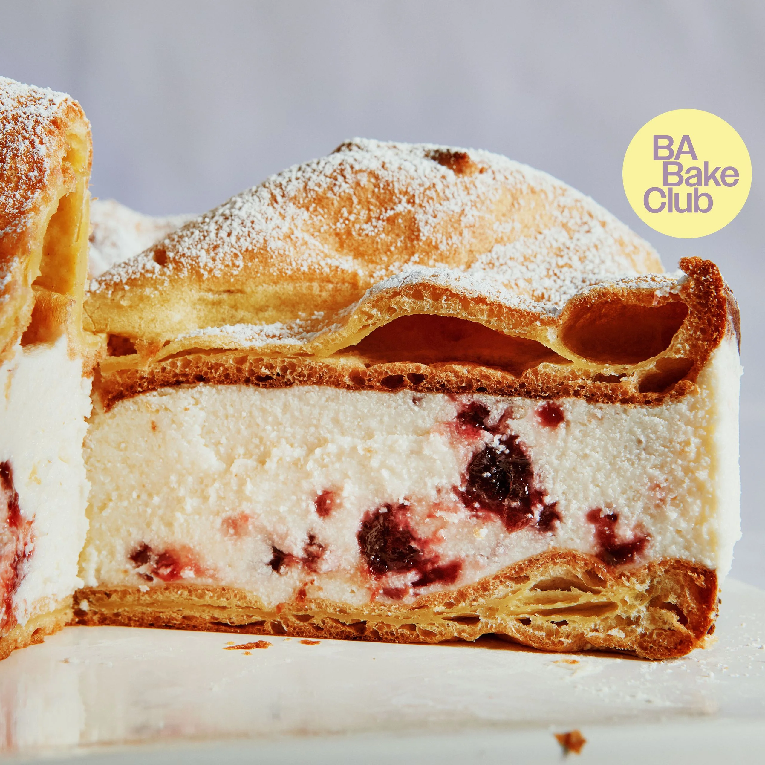 Two layers of choux pastry separated by a layer of sweetened cream cheese and plum compote.