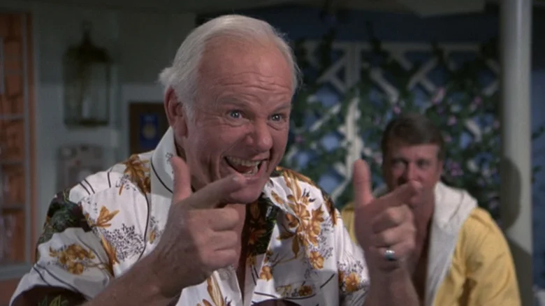 Alan Hale Jr.'s Gus Dolan makes finger guns in The Love Boat