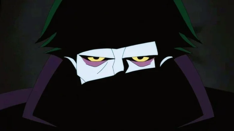 The Joker in shadow in Batman: Caped Crusader
