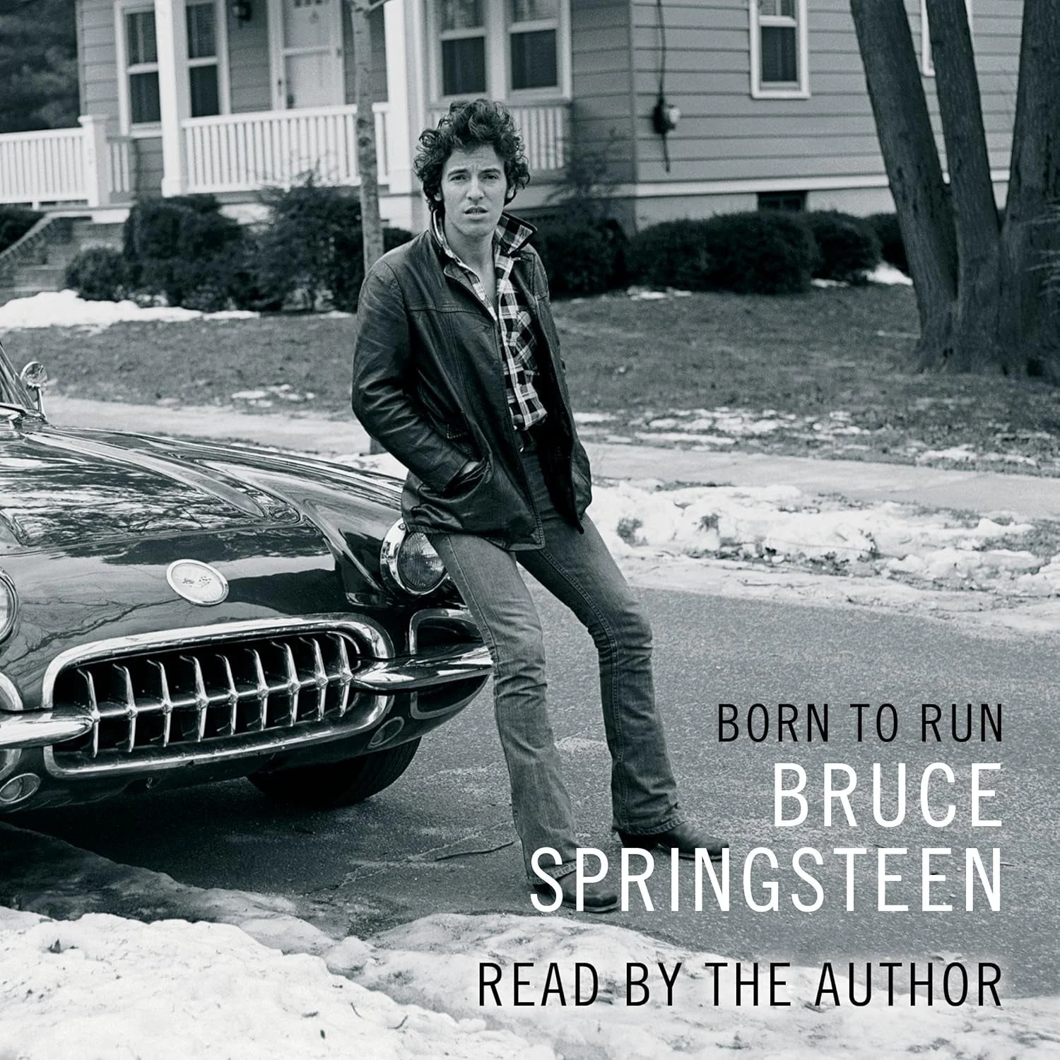 Bruce Springsteen leans on a classic car in a residential neighborhood. Text: "Born to Run, Bruce Springsteen, Read by the Author."