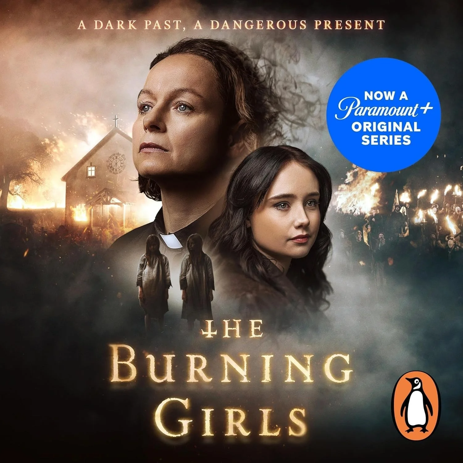 Two women's faces with a church and smoke in the background. Text reads: "The Burning Girls, A Dark Past, A Dangerous Present. Now a Paramount+ Original Series."