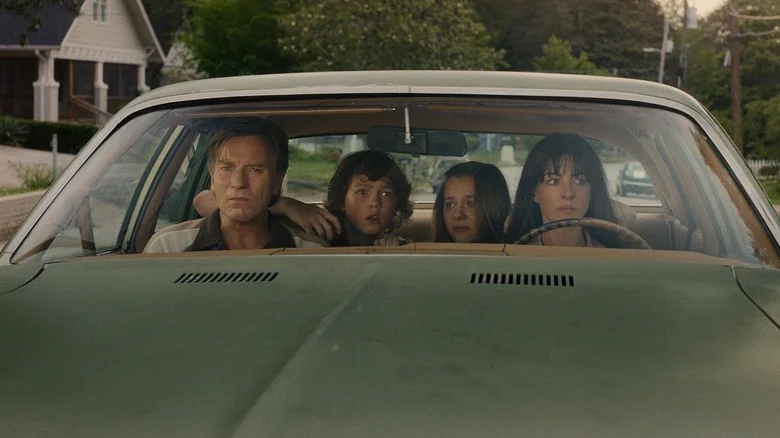 The Platt family in their car in The End of Oak Street