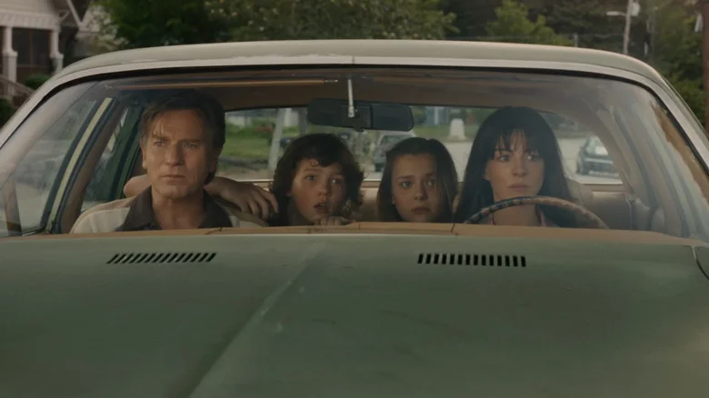 The Platt family staring out of the windshielld of the car in The End of Oak Street
