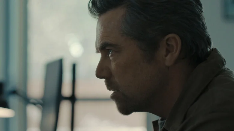 Patrick Brammall's Ian Ridley is seen in profile as leans forward in Last Seen