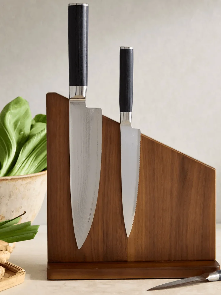 Image may contain: Cutlery, Blade, Weapon, Knife, Chopping Board, Food, Cricket, Cricket Bat, and Sport