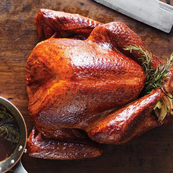 Image may contain Dinner Food Supper Meal Roast Bread Turkey Dinner Blade Weapon Knife Weaponry and Animal